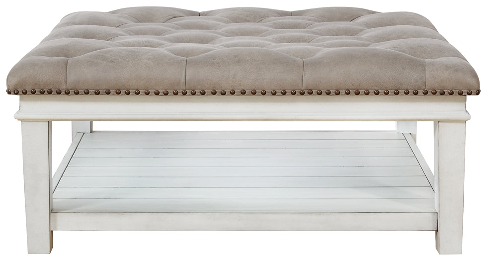 Ashley Express - Kanwyn UPH Ottoman Cocktail Table - DecorGalore4U