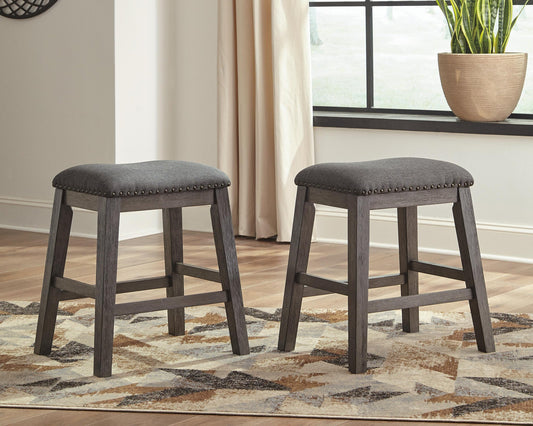 Ashley Express - Caitbrook Upholstered Stool (2/CN) - DecorGalore4U