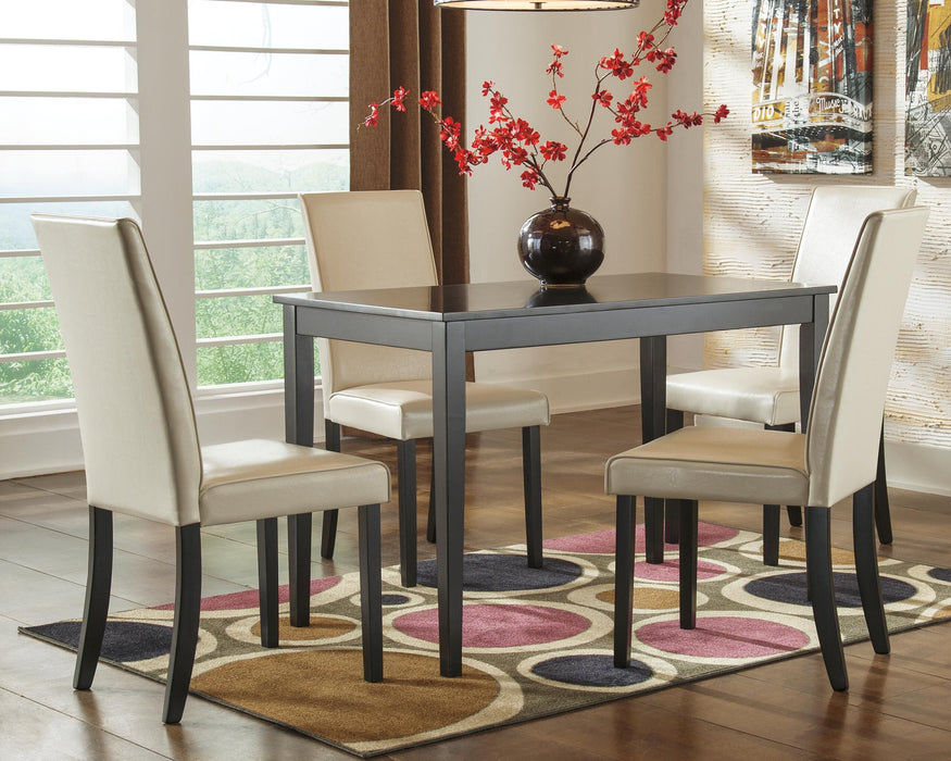 Ashley Express - Kimonte Rectangular Dining Room Table - DecorGalore4U