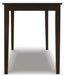 Ashley Express - Kimonte Rectangular Dining Room Table - DecorGalore4U