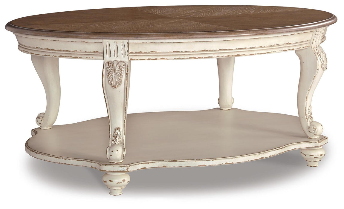 Ashley Express - Realyn Oval Cocktail Table - DecorGalore4U