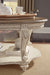 Ashley Express - Realyn Oval Cocktail Table - DecorGalore4U