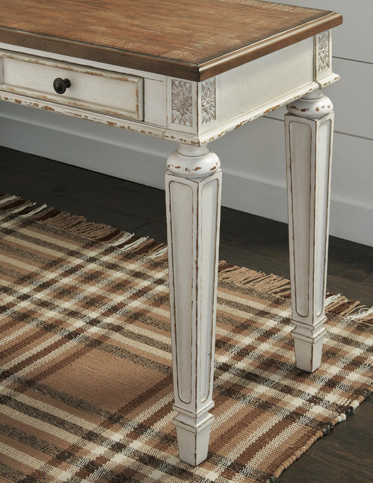 Ashley Express - Realyn Home Office Desk - DecorGalore4U
