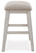 Ashley Express - Skempton Upholstered Stool (2/CN) - DecorGalore4U