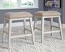Ashley Express - Skempton Upholstered Stool (2/CN) - DecorGalore4U