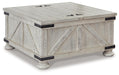 Ashley Express - Carynhurst Cocktail Table with Storage - DecorGalore4U