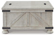 Ashley Express - Carynhurst Cocktail Table with Storage - DecorGalore4U