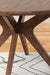 Ashley Express - Lyncott Round Dining Room Table - DecorGalore4U