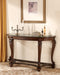 Ashley Express - Norcastle Sofa Table DecorGalore4U - Shop Home Decor Online with Free Shipping