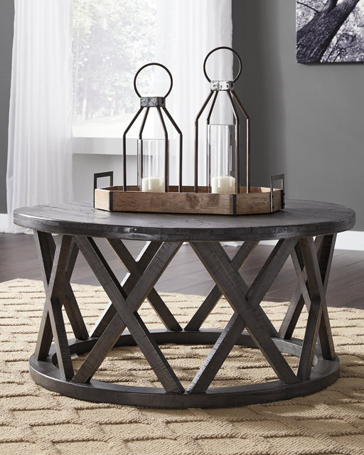Ashley Express - Sharzane Round Cocktail Table DecorGalore4U - Shop Home Decor Online with Free Shipping